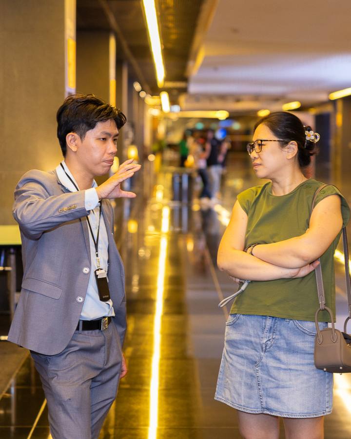 A Crestbrick realtor talking a client through options after an event